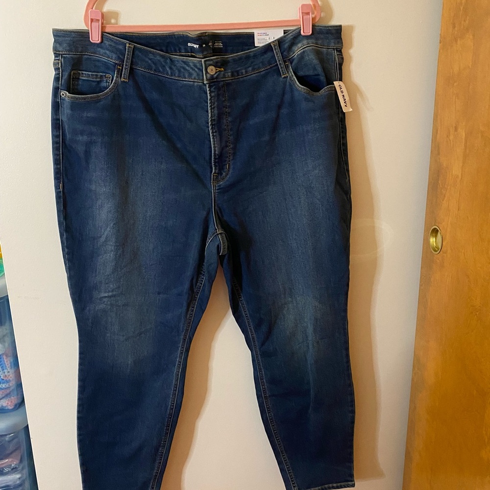 Old Navy women’s 26 medium wash high rise Rockstar super skinny distressed jeans